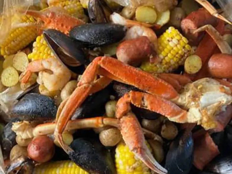 Little-King-Crab-Hawaiian-restaurant-Shrimp-based-Seafood-Platter-Crystal-Lake Seafood platter with shrimps, including various shellfish at Little King Crab, a Hawaiian restaurant in Crystal Lake